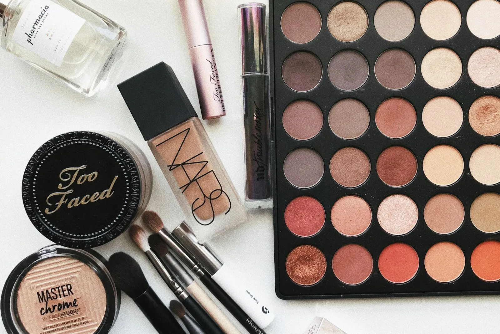 An assortment of cosmetics and beauty products laid out together